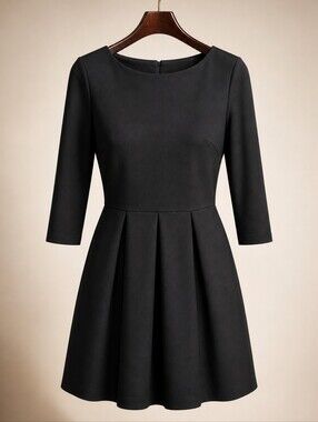 New Topshop black Ponte dress. Pleated skirt. Back hidden zipper. Size 8.